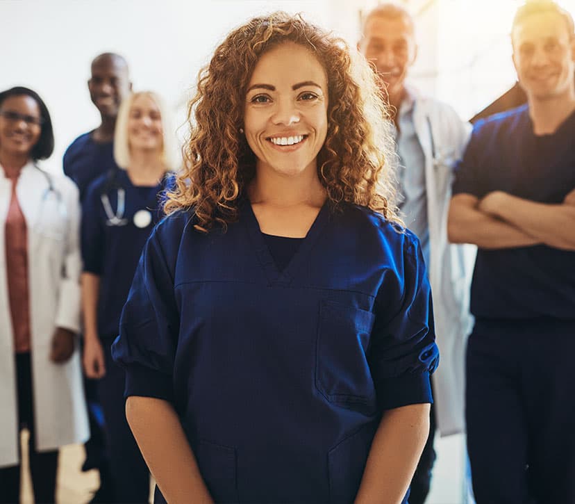 smiling curly hair nurse